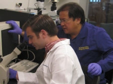 Jonathan Schall, left, works with George Gomez, Ph.D, associate professor of biology, on a research project in the Loyola Science Center. Schall is among the nine University of Scranton students who received 2012 President’s Fellowship for Summer Research Awards.  